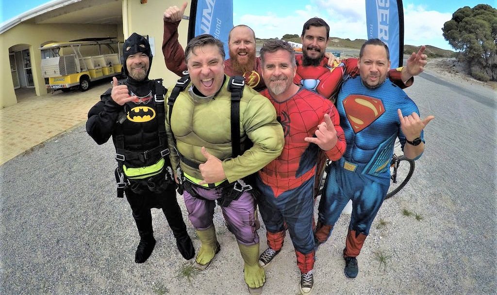 Fathers skydiving dressed as superheroes 