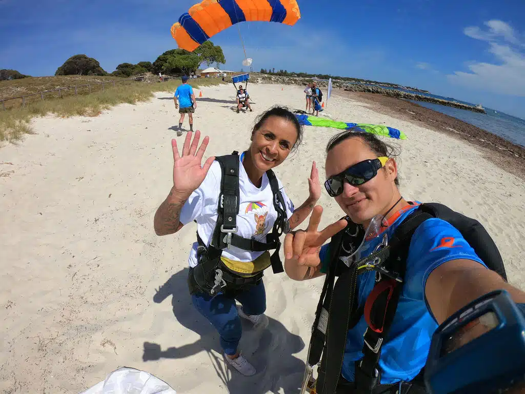 Landing on the beach in Rottnest on the beach smiling student and instructor